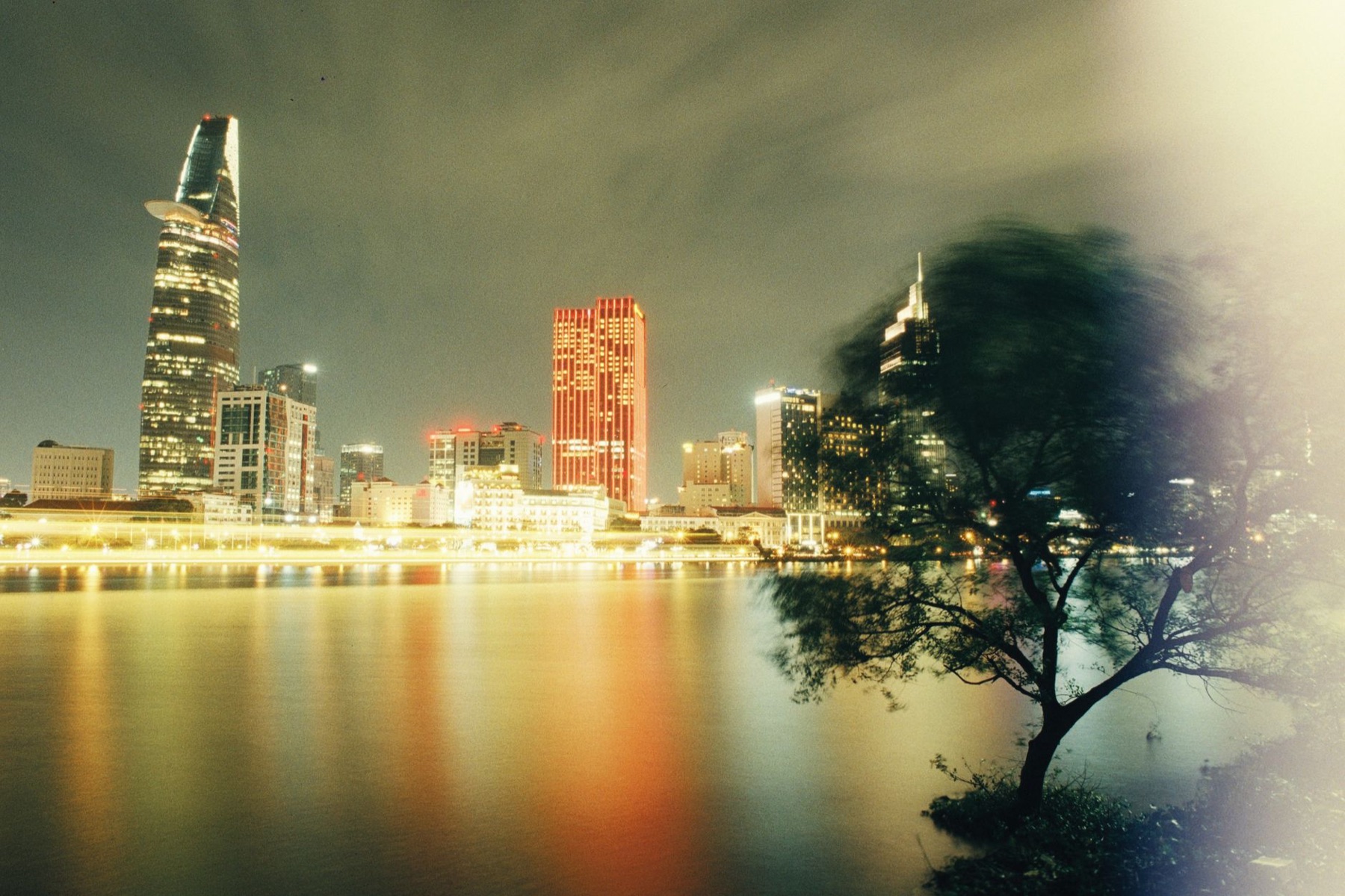 Ho Chi Minh City — Stunning Ho Chi Minh City skyline with illuminated skyscrapers reflecting in the