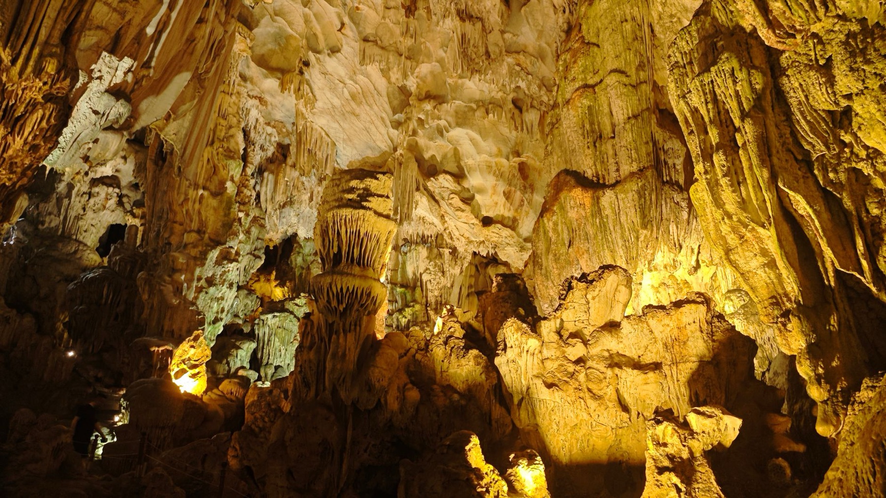 Phong Nha — Explore the stunning limestone formations inside a cave in Ha Long Bay, Vietnam.
