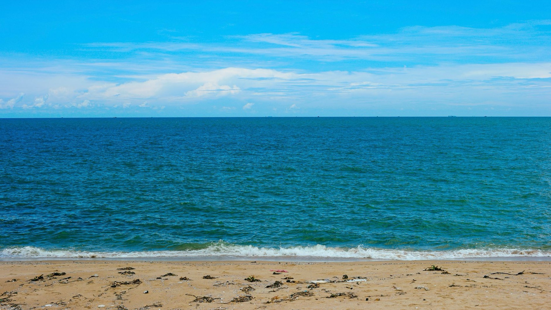 Vung Tau — Peaceful beach scene with clear blue water in Ho Chi Minh City.
